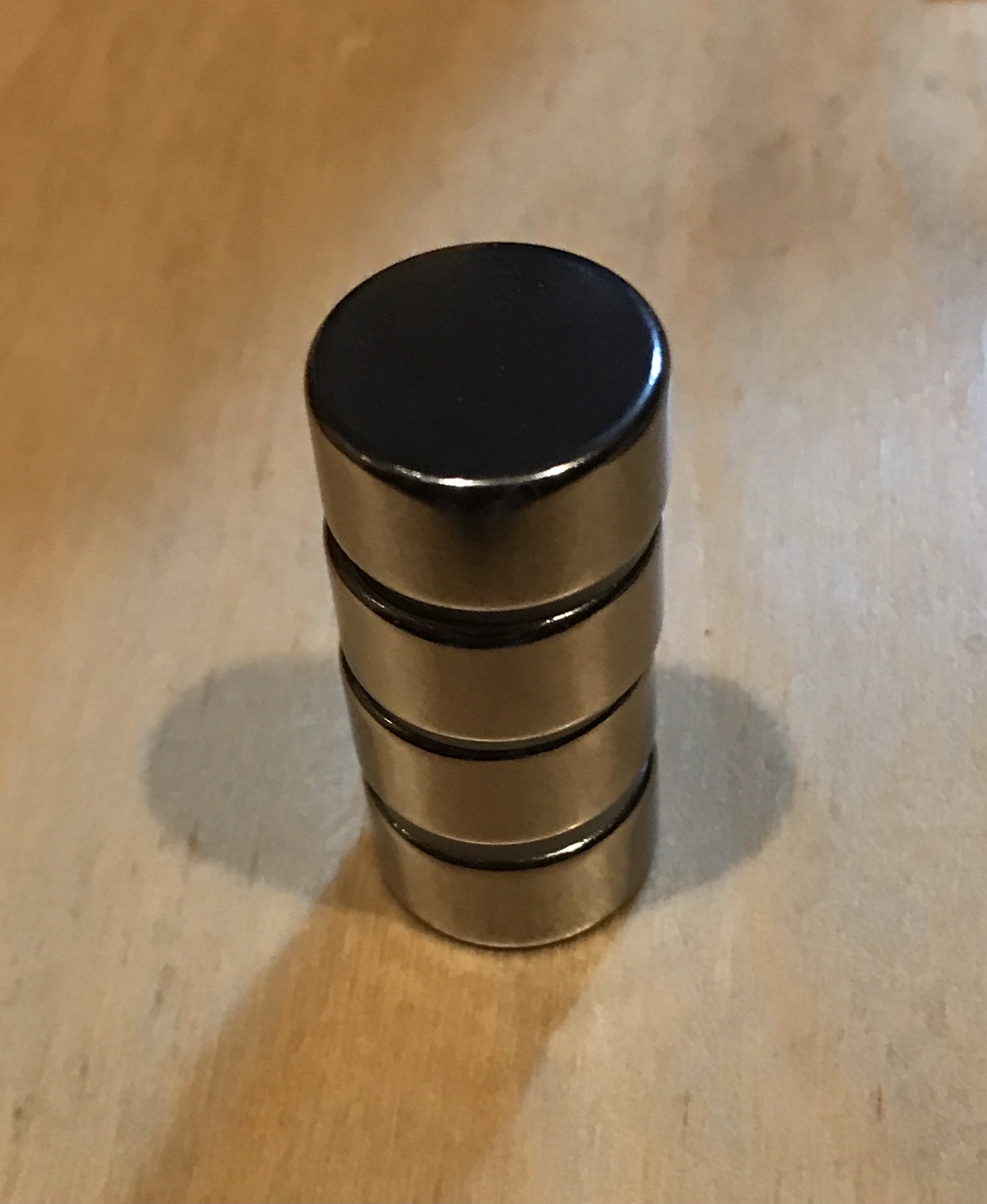 A stack of four neodymium magnets